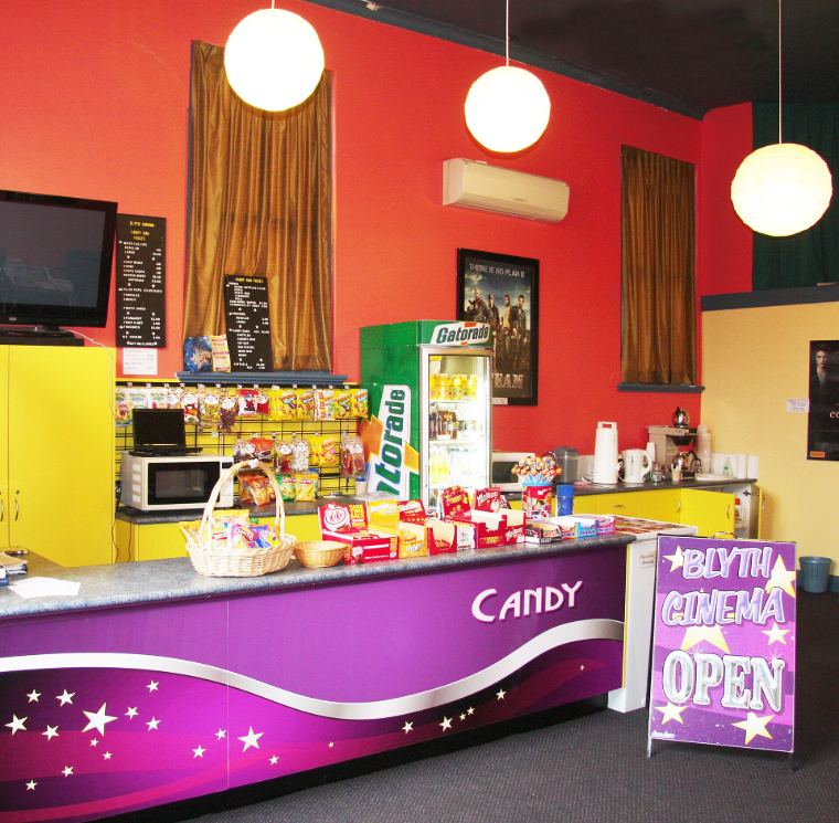 A colourful cinema candy bar with snacks and drinks